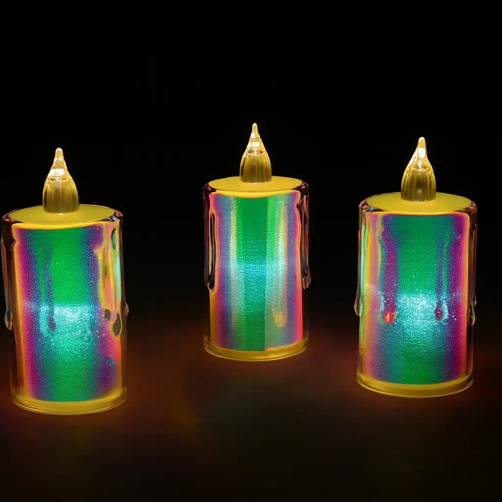 Three LED flameless candles with rainbow-colored glowing effect and realistic flame-shaped tops, displayed against a dark background