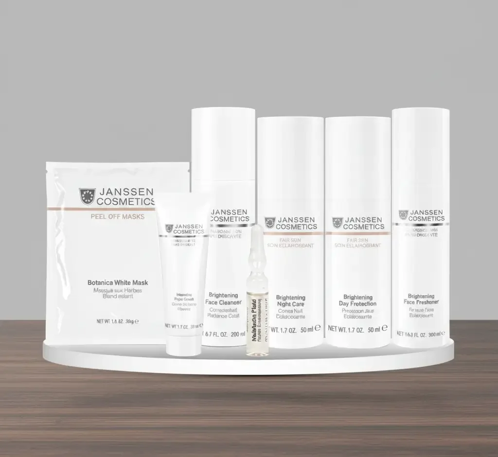 Janssen Cosmetics Brightening Skincare Set including face cleanser, day and night cream, mask, and brightening ampoule for radiant and even-toned skin."
