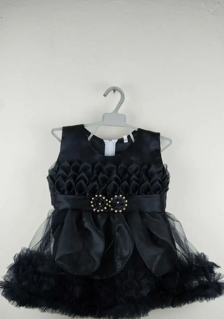 Black Toddler Dress with petal-textured bodice, satin bow waistband, and layered tulle skirt