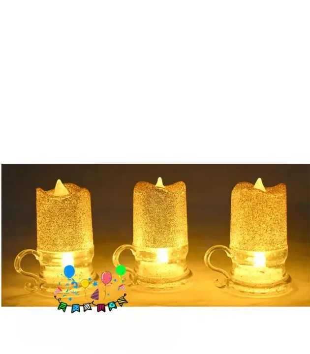 Glitter party mug candle with gold top, clear mug base, and festive birthday balloon graphics